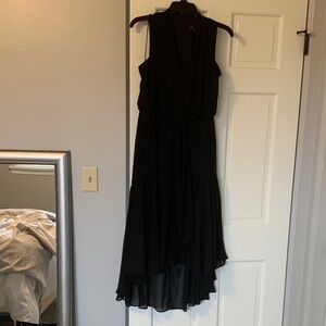 Just…Taylor brand sleeveless black dress.  Women’s size 6.